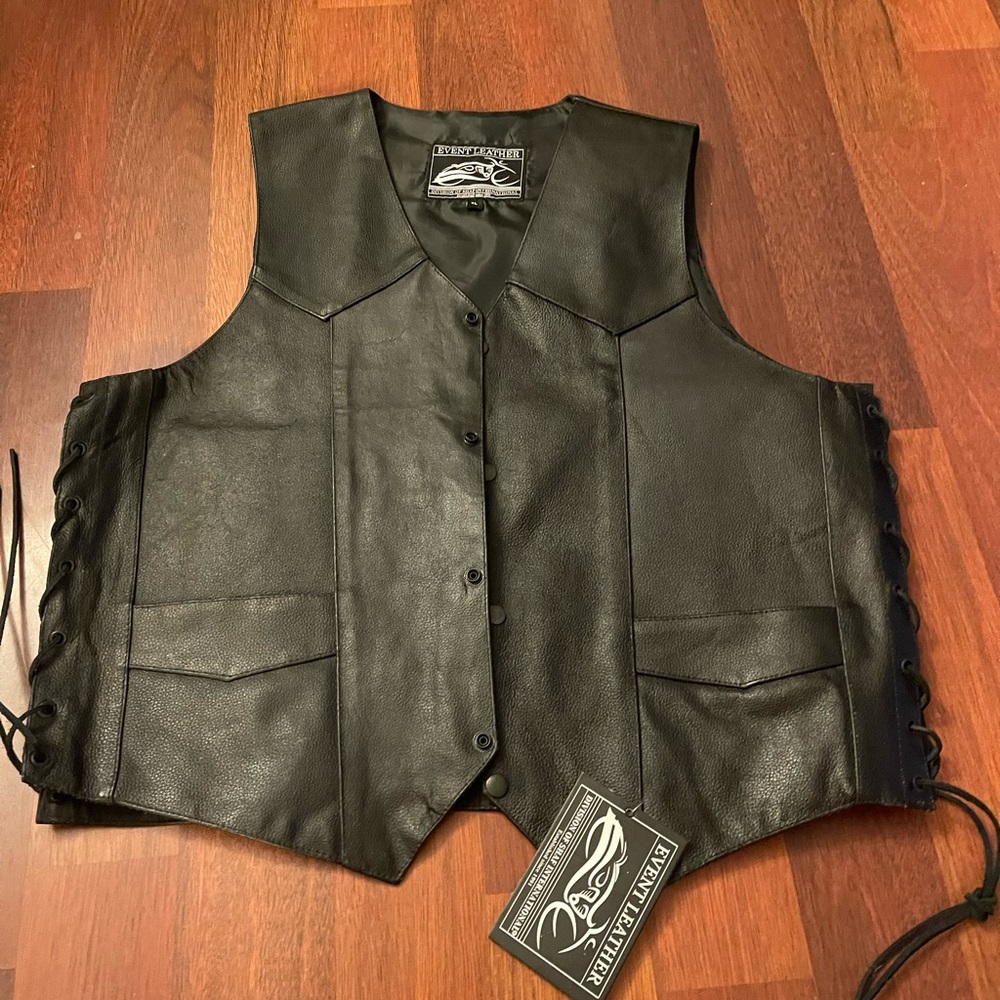 Event leather vest. XL black. Brand new with tags.